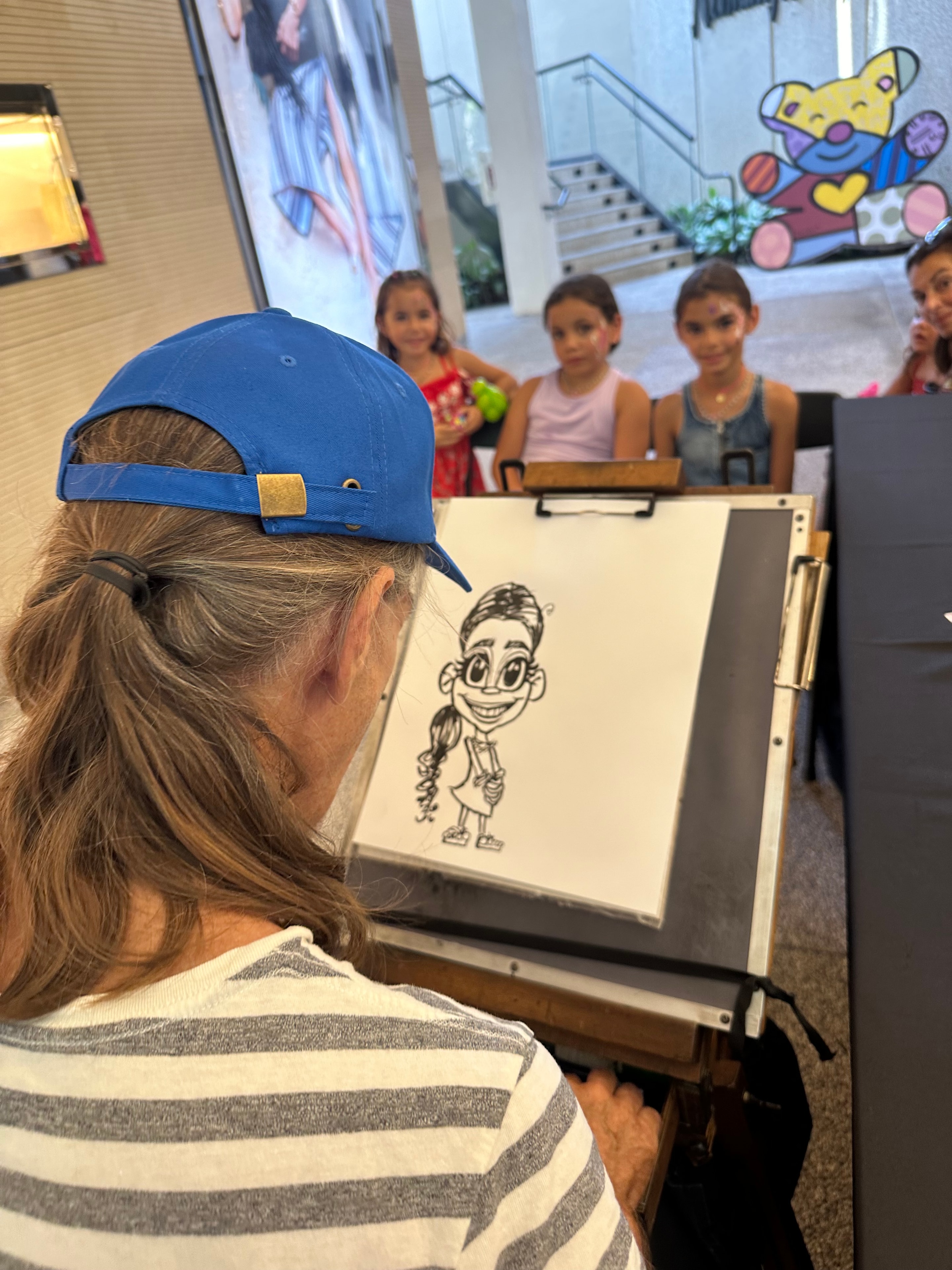 OOOPSY caricature artist at Holtz Children's Hospital fundraiser
